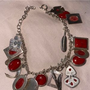 Red coral rhodium over silver charm bracelet